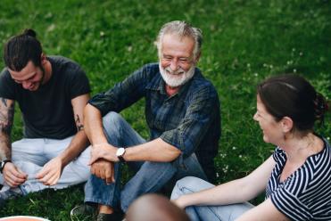 Young and old people talking